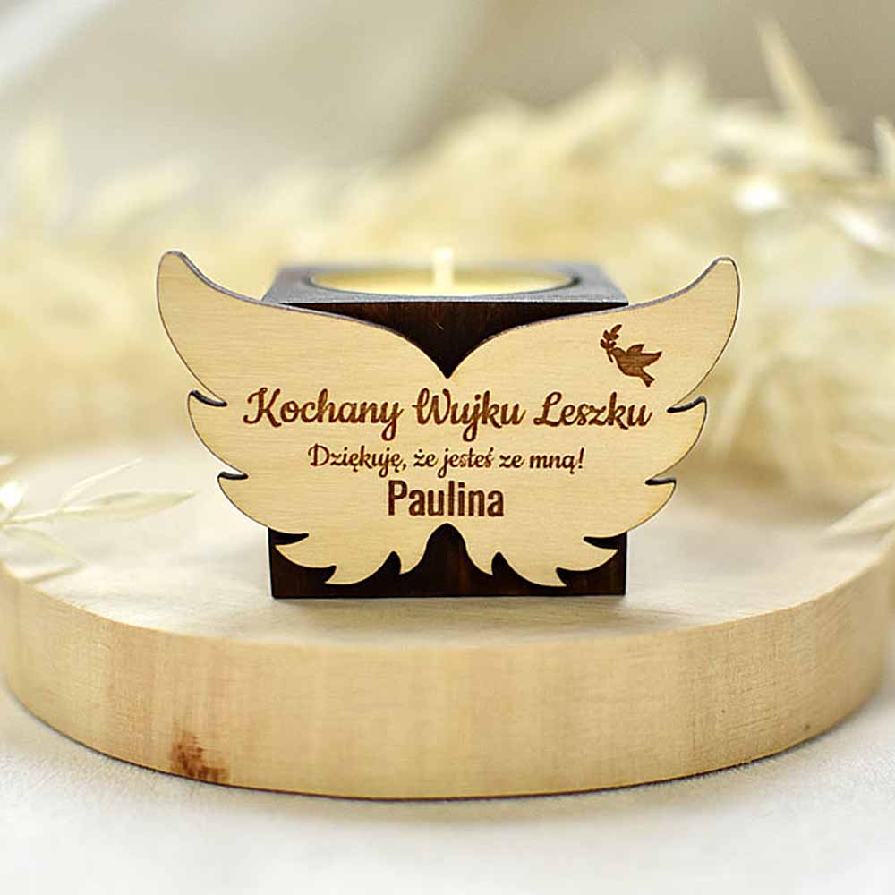 świecznik dla gości z skrzydłami aniołka